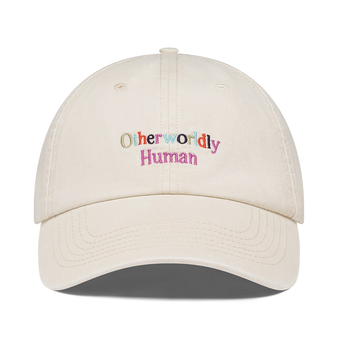 Beige baseball cap photographed on white background, front view