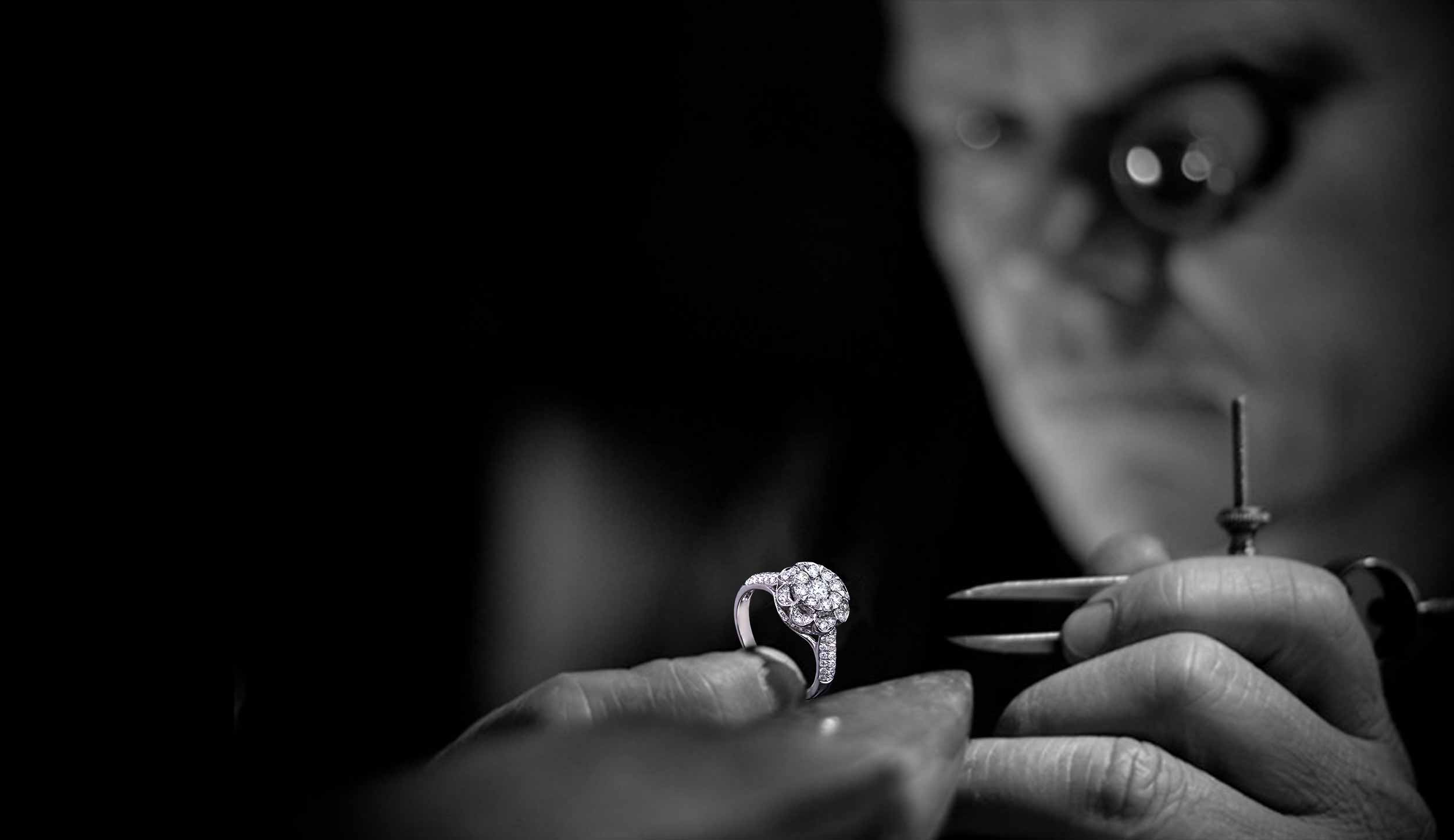 Jewelry designer works on the ring